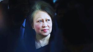 একটি কফিনের পাশে পুরো বাংলাদেশ